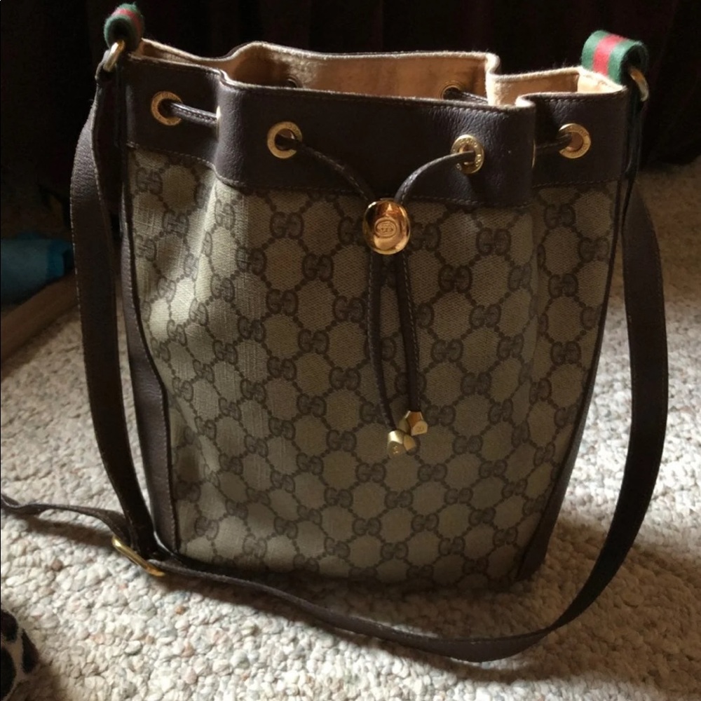 Gucci.  Crossover bag